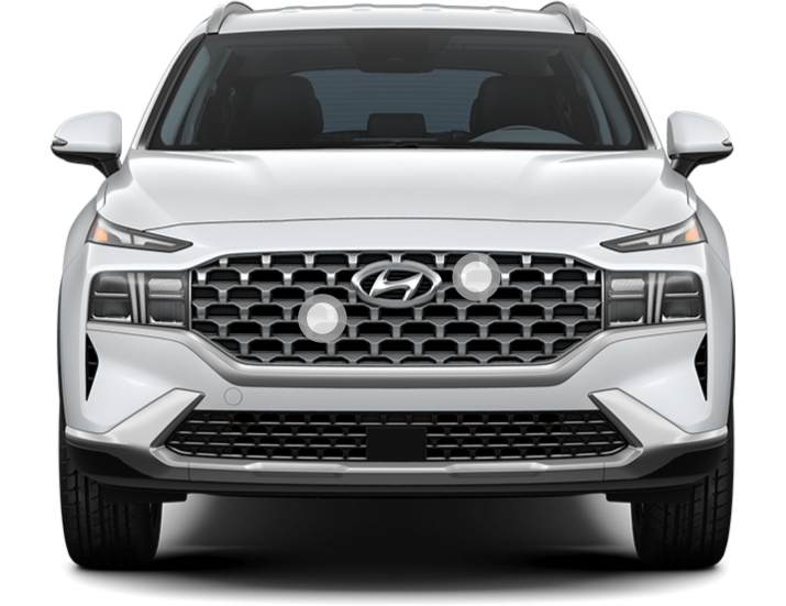 Front view of a white Hyundai Santa Fe.