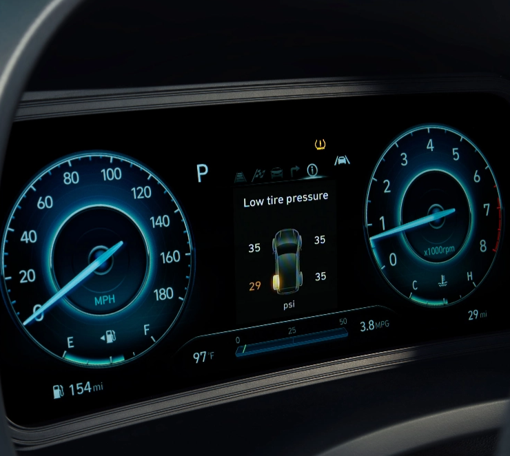 Dashboard with Tire Pressure Monitoring System (TPMS) warning and low tire pressure alert