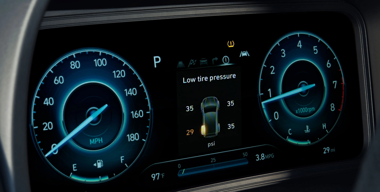 Dashboard with Tire Pressure Monitoring System (TPMS) warning and low tire pressure alert