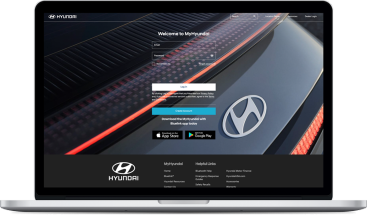 Laptop displaying MyHyundai login screen.